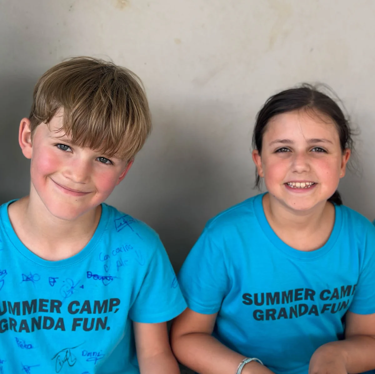 Palacio de Granda students with Summer Camp t-shirt